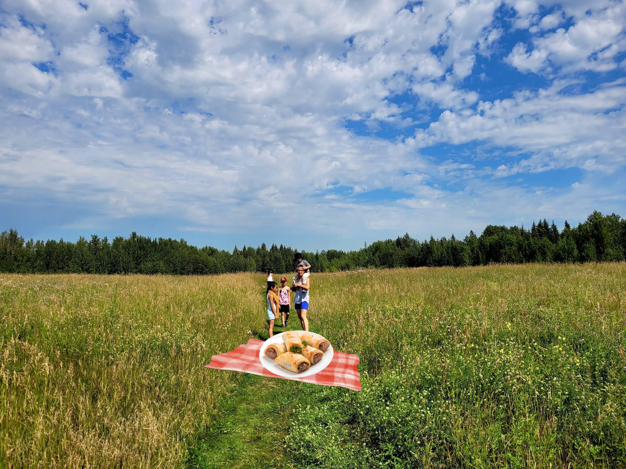 People having a sausage roll picnic